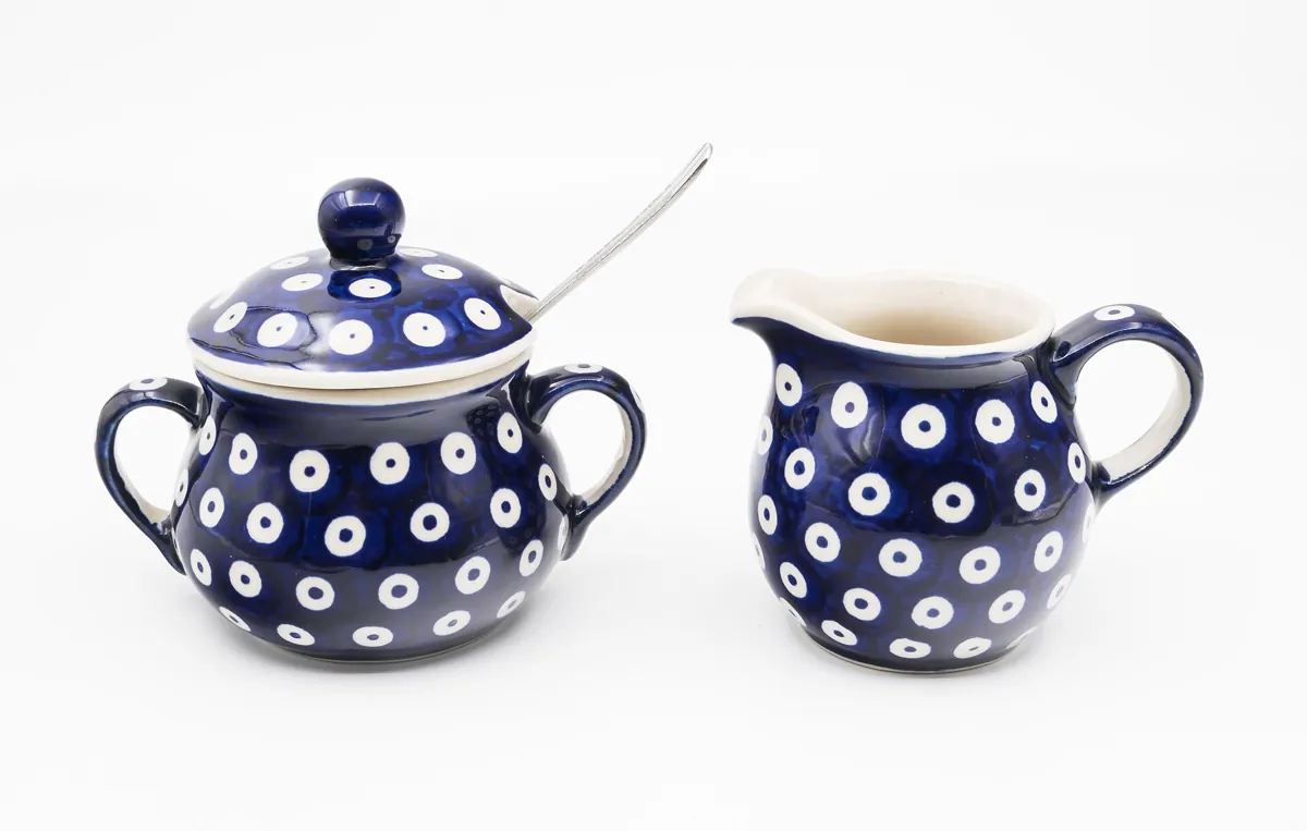 Bolesławiec pottery: a sugar bowl and a jug in the typical dot pattern